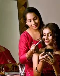Kavita Doing Bridal makeup of a model