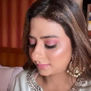 Model showcasing evening makeup look by Kavita