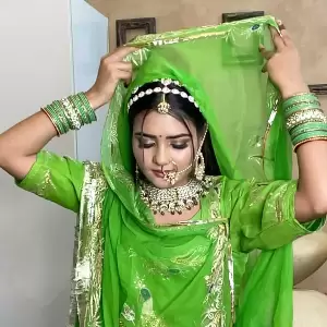 Model displaying bridal makeup by Kavita