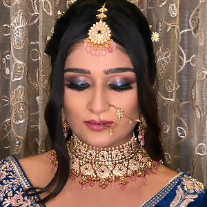 Model showcasing bridal makeup look designed by Kavita Bronze n Shadow